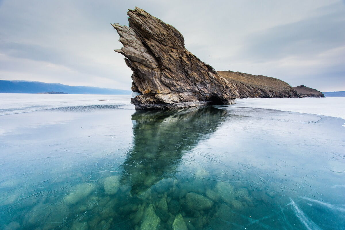 Озеро юнеско россия. Озеро Байкал. Озеро Байкал ЮНЕСКО. Памятник ЮНЕСКО озеро Байкал. Озеро Байкал природное наследие ЮНЕСКО.